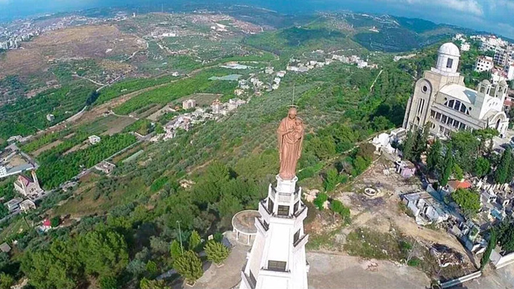 المطران حدّاد يصلّي مساءً في مغدوشة